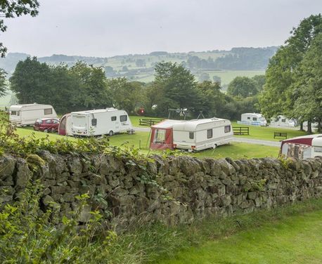 If you’re looking for peace, quiet and wonderful views teamed with walking and cycling, Bakewell Club campsite is for you. Its idyllic location near the pretty village of Youlgreave in the Peak District National Park offers a true back to nature camping experience. Campers report that the site’s minimum facilities are part of its appeal.

Bakewell campsite enjoys a peaceful, rural setting with stunning views over the Derbyshire countryside. The attractive site is excellently maintained and its 100 pitches are spacious, some benefit from the shelter of trees which dot the site. There’s also a small dog walk and a children's play area.