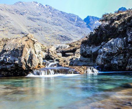 This short walk on the Isle of Skye visits one of the most magical places in Scotland – the stunning waterfalls of the Fairy Pools.