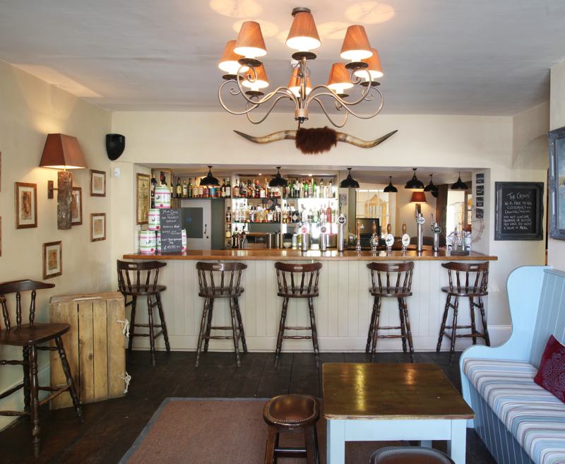 The Crown’s bar is a warm and inviting area with a roaring wood-burner for people to relax and warm themselves on the coldest of days.

Stocked with a wide range of local ales, premium spirits and a large selection of international wines.