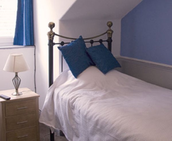 Theakstons is our single bed room, located in the loft space on the second floor. En-Suite Room “Wet Room Style” with “Drench” Shower.
With a view of Castleberg Crag this comfortable room will ensure you have a relaxing nights stay. Rate includes Breakfast.