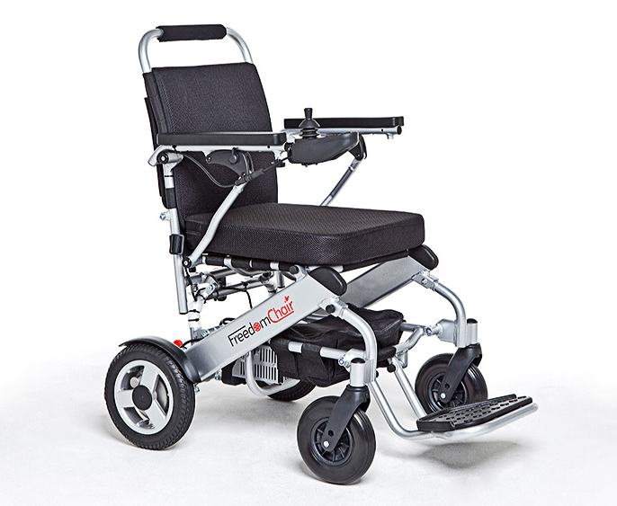 With a 17” wide seat and user limit of 110kg, the A06 is good both indoors and outdoors thanks to the 10” rear wheels and built-in anti-tip device.

 	Powerful lithium batteries can be charged both on and off the chair. Certified for airline travel.
 	Electromagnetic brakes hold the chair automatically on slopes
 	Motors can be disengaged to allow the chair to freewheel
 	Armrests can be lifted to allow sideways transfers or to clear table tops
 	Driving range up to 9 miles per battery (max 2)
 	Handy under-seat bag for personal items.
 	Back seat storage compartment
 	Durable travel bag supplied.