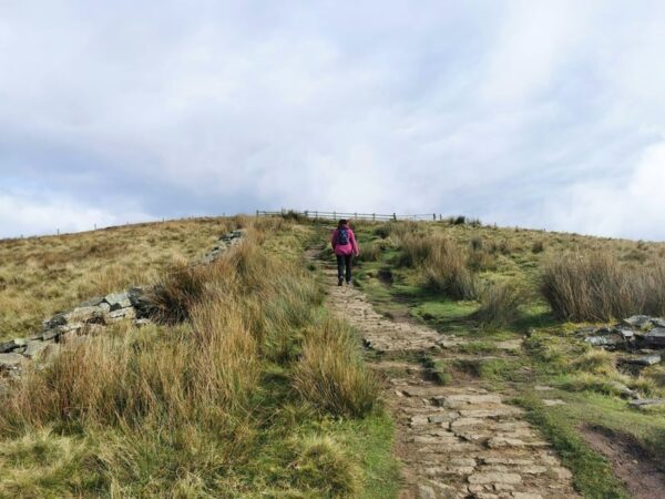 Walking uphill for fitness.